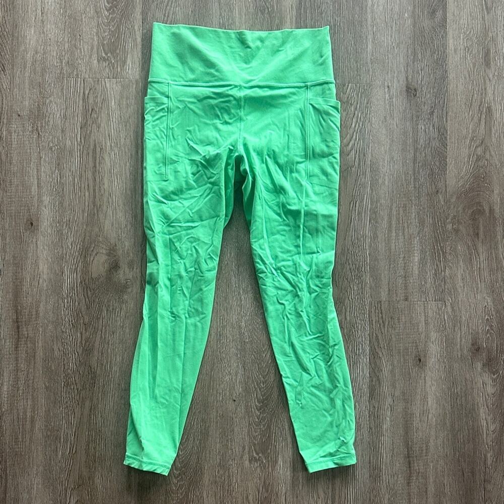 Athleta Salutation Stash Tight Leggings Neon Green Medium Athletic Pockets